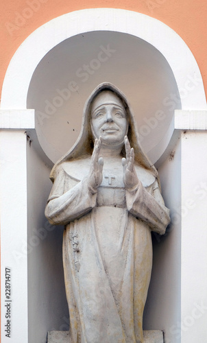 Blessed Marija Petkovic statue on facade of cathedral of Assumption in Varazdin, Croatia  photo