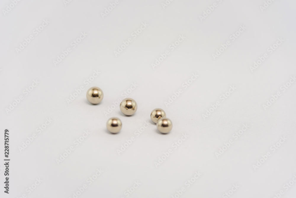 Studio photo decorative metal balls on a white background Studio photo decorative metal balls on a white background