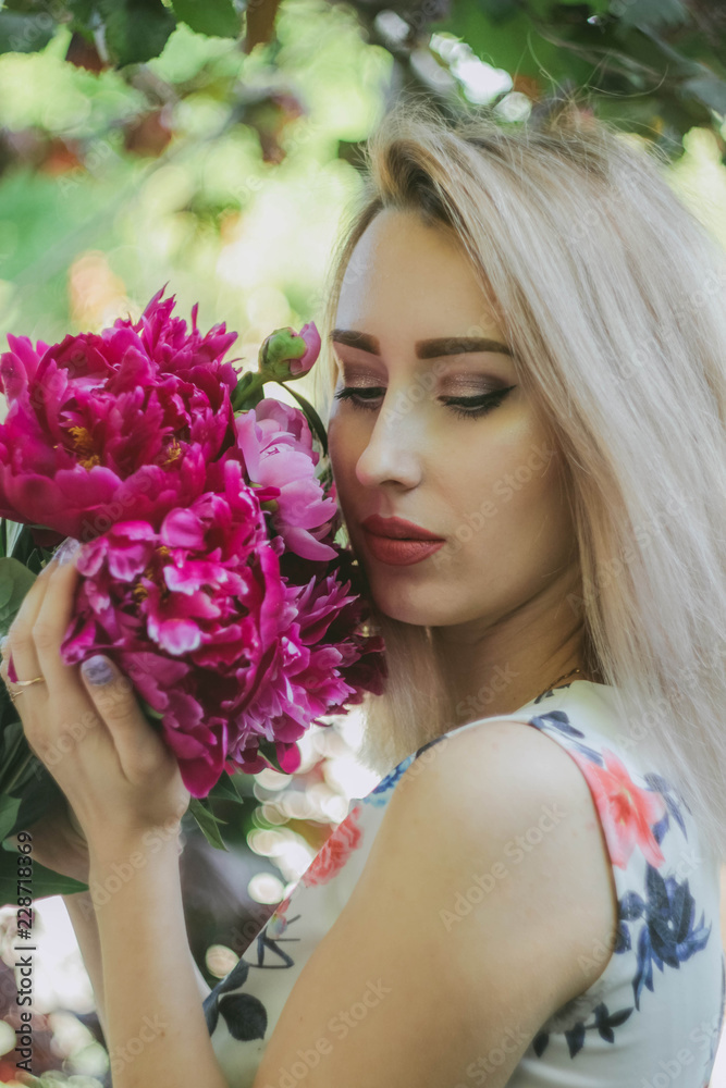 girl with flowers, on a background of flowers, sunflower, with a bouquet of roses, wild flowers girl with flowers, on a background of flowers, sunflower, with a bouquet of roses, wild flowers