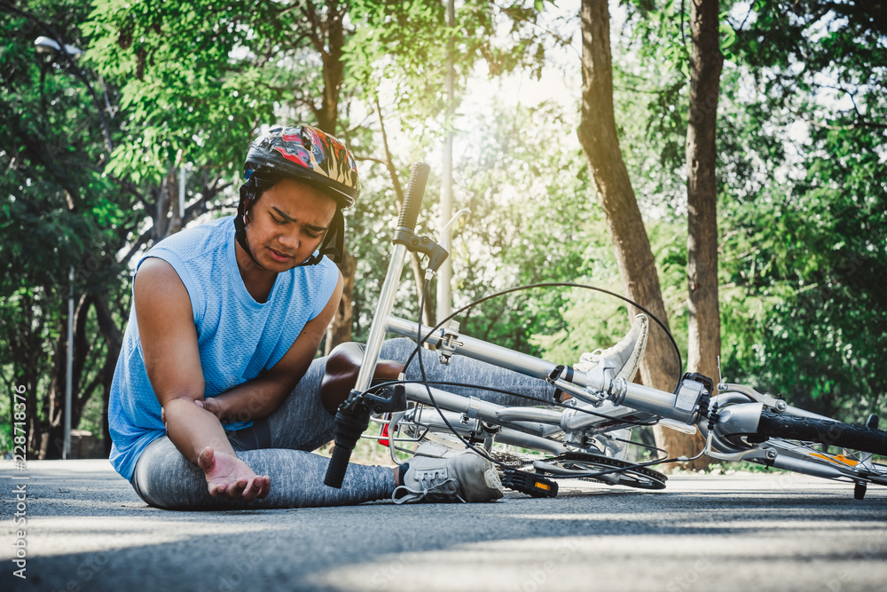 Boy injury hurts from falling bike, hurt on his arms, pain ache from