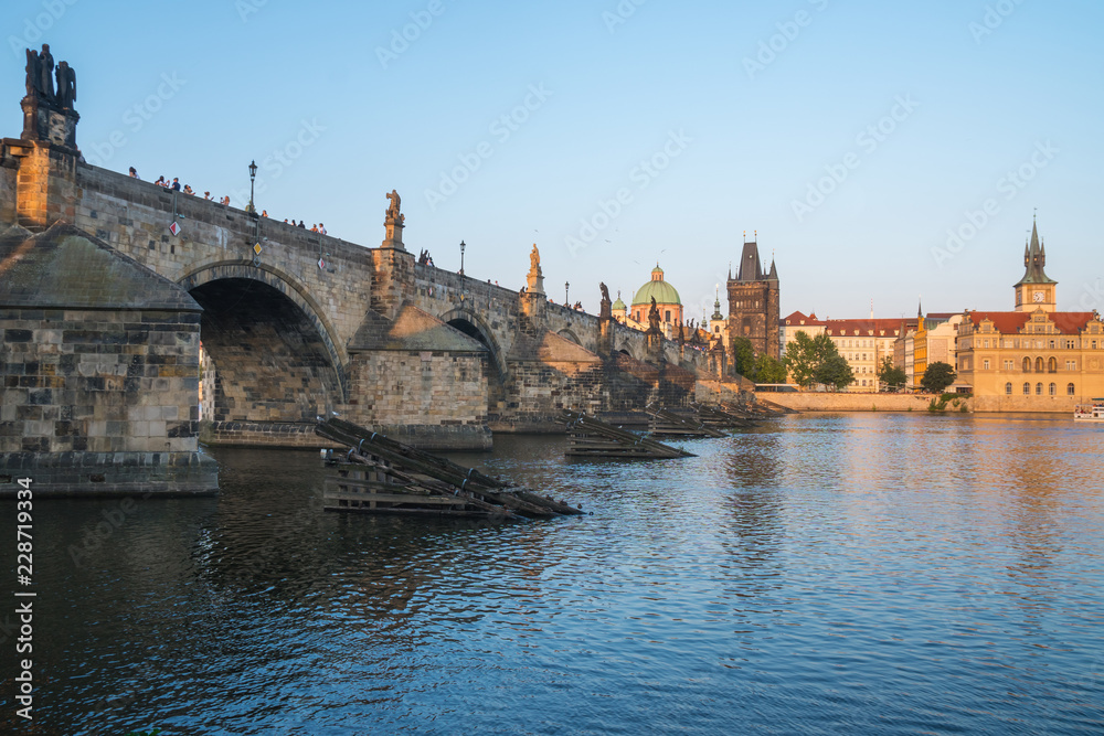 Pedestrians only Charles Bridge over Vltava river in Prague, Czech Republic