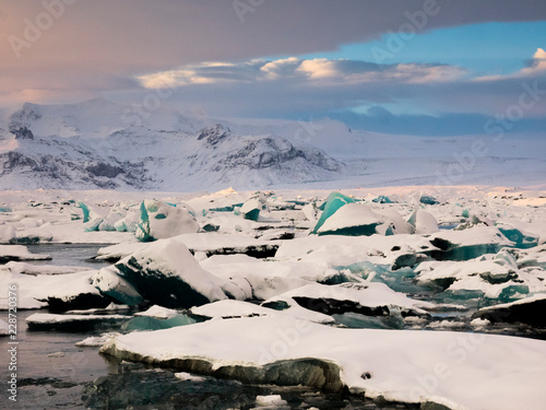 JOKULSARLON, ICELAND Detail of blue ice sculptures at glacier lagoon in southern Iceland. photo