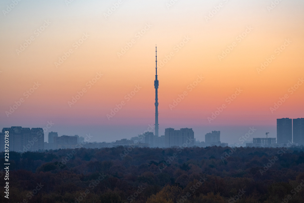 sunrise sky over city and urban park