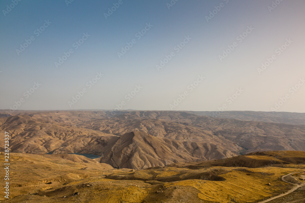 Karak, Jordan. 7th June 2015. View of rolling hills and mountains beyond the town of Karak.