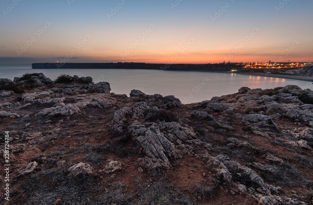 view from cliff at colorfull sunset in portugal algarve