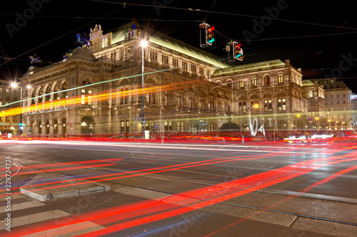 Photography Vienna State Opera at night with car light trails on the Vienna Ring street