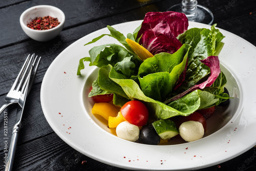 Salad mix with cherry tomatoes, sweet peppers, olives and Ciligini cheese. Salad mix with cherry tomatoes, sweet peppers, olives and Ciligini cheese.