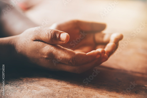 Children dirty open hand begging for money photo