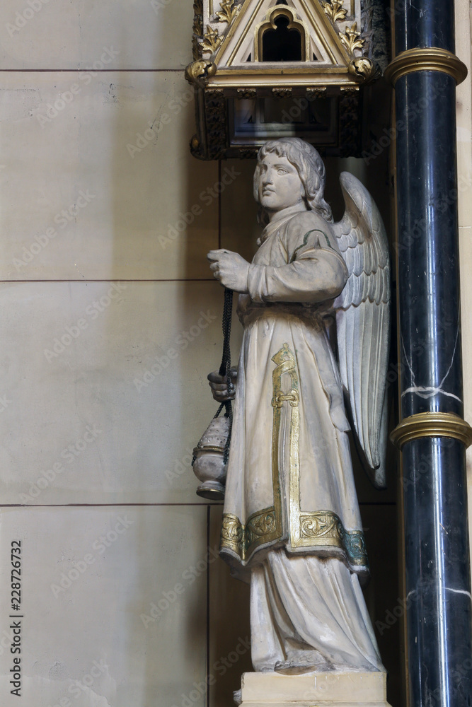Obraz premium Angel at the altar of the Holy Cross in Zagreb cathedral dedicated to the Assumption of Mary