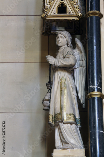 Angel at the altar of the Holy Cross in Zagreb cathedral dedicated to the Assumption of Mary