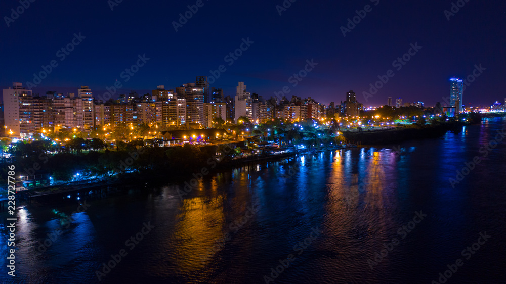 Aerial shot over Rosario City at night	