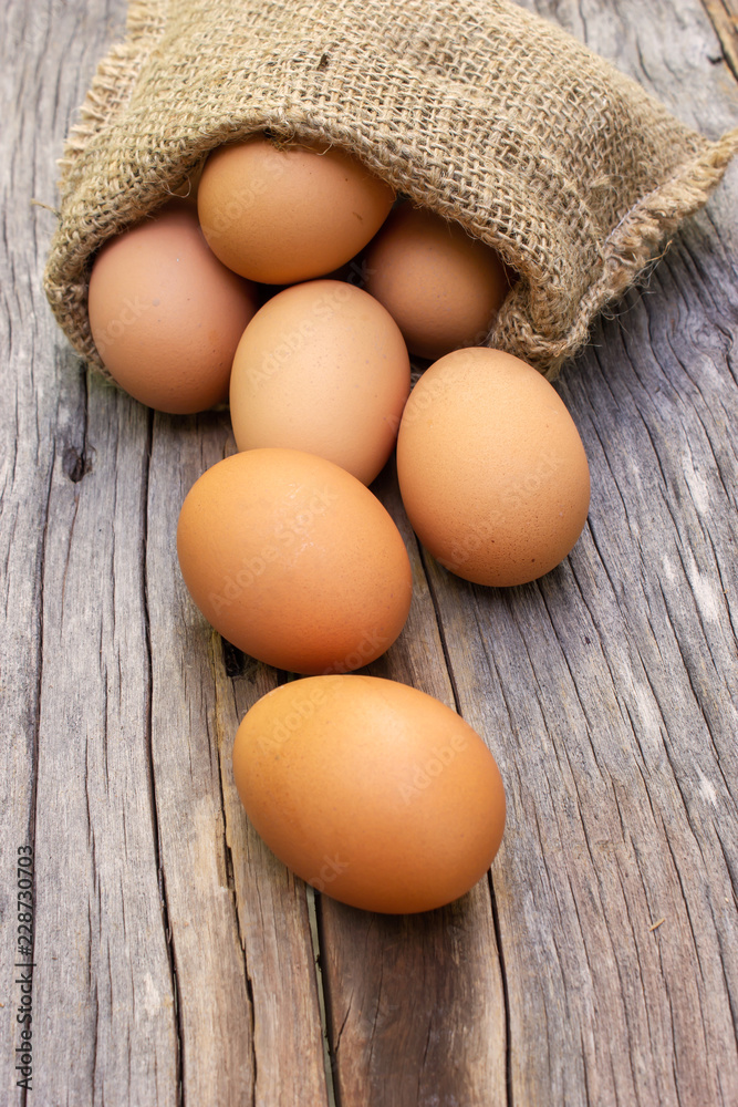 Fresh egg roll down on wooden table. Food ingredient. Fresh egg roll down on wooden table. Food ingredient.