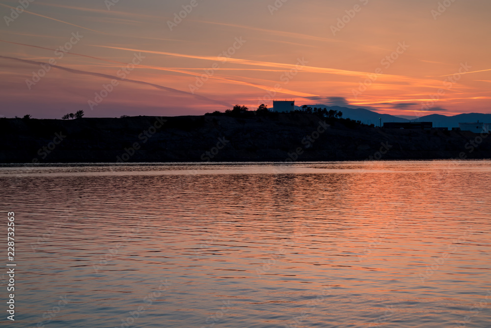 Sunset at the sea in Omisalj, island Krk, Croatia