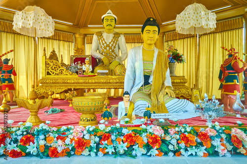 The sculptures of King Mindon and his wife, Mandalay, Myanmar photo