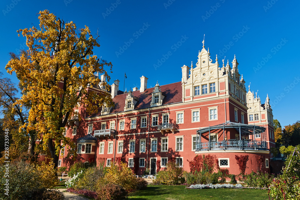 New Castle in the park Muskauer  during autumn in Germany.