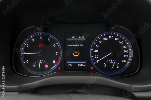 low washer fluid dashboard sign illuminated