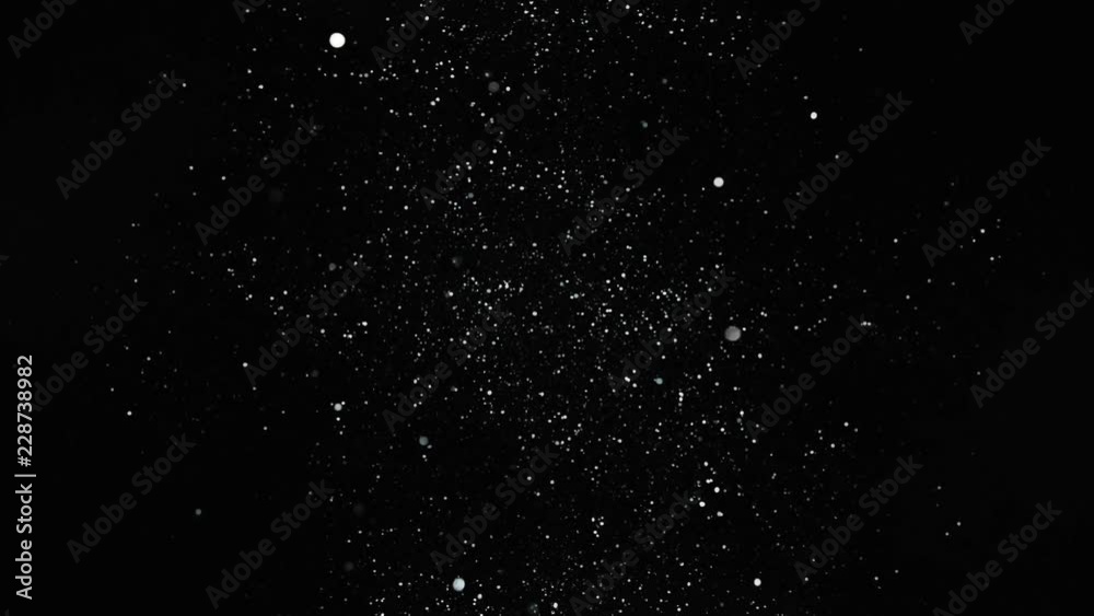 Sliver glitter background in super slow motion shooted with high speed cinema camera. Sliver glitter background in super slow motion shooted with high speed cinema camera.