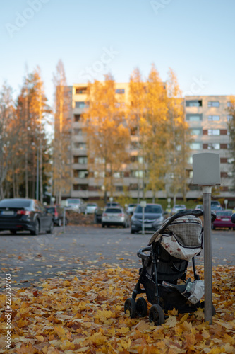 abandoned stroller in the suburbs