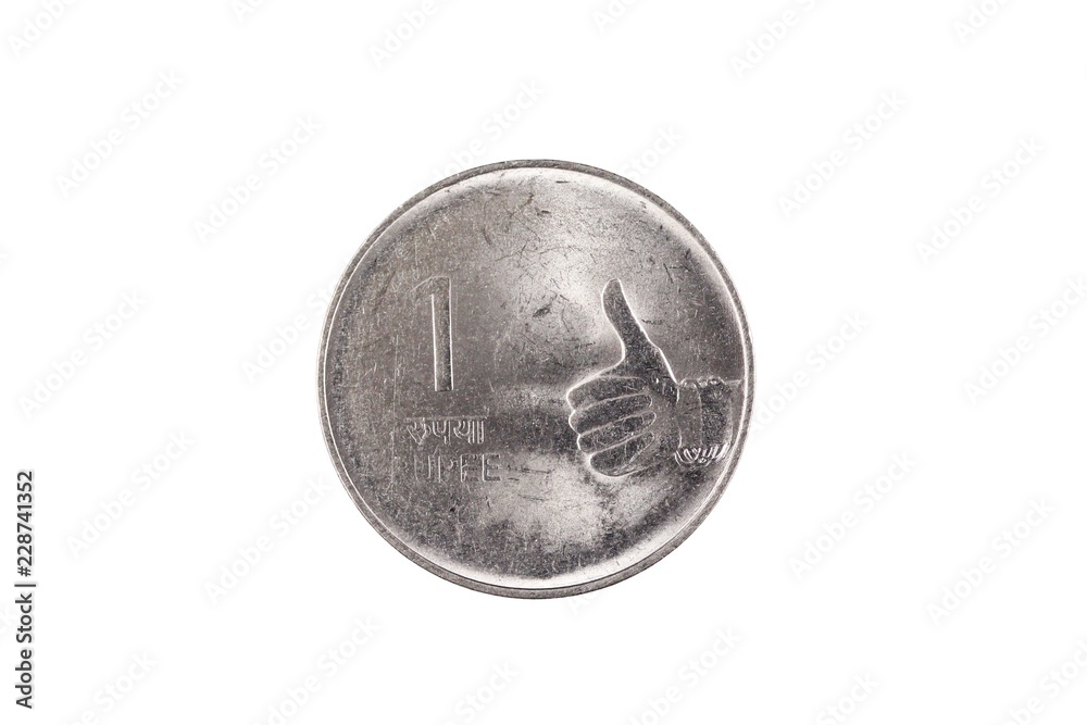 An extreme close up of an Indian one rupee coin on a solid white background An extreme close up of an Indian one rupee coin on a solid white background