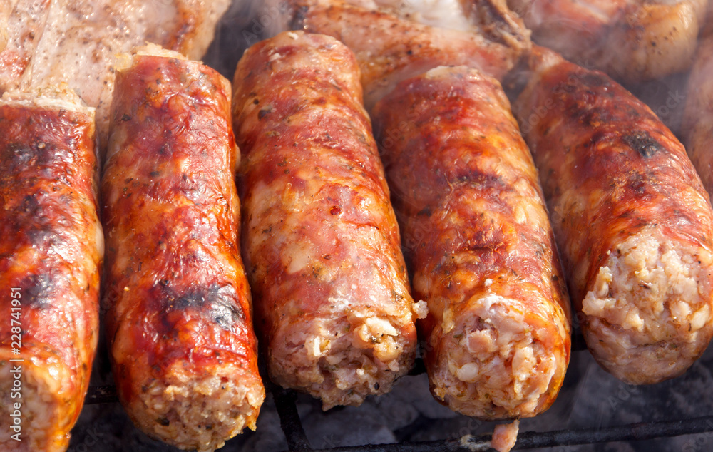 Close up of sausages on barbecue
