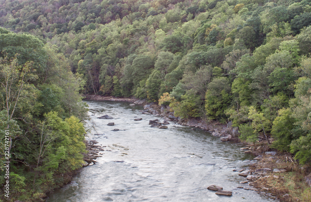 The Youghiogheny River as it flows through Ohiopyle State park in the summer The Youghiogheny River as it flows through Ohiopyle State park in the summer