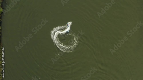 Overhead view of someone jet skiing and doing doughnuts in the Delta in Antioch Northern California photo