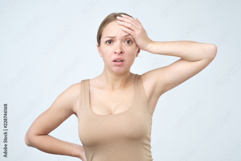 Obraz premium Sad woman serious and concerned looking worried and thoughtful facial expression feeling depressed