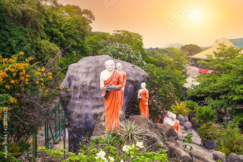 Buddhist Monk statues in Dambulla. Sri Lanka. photo