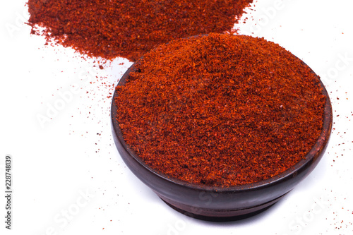 red chili powder isolated on white background 