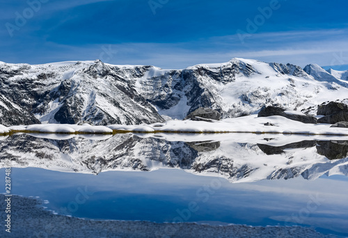epic mountain lake reflection