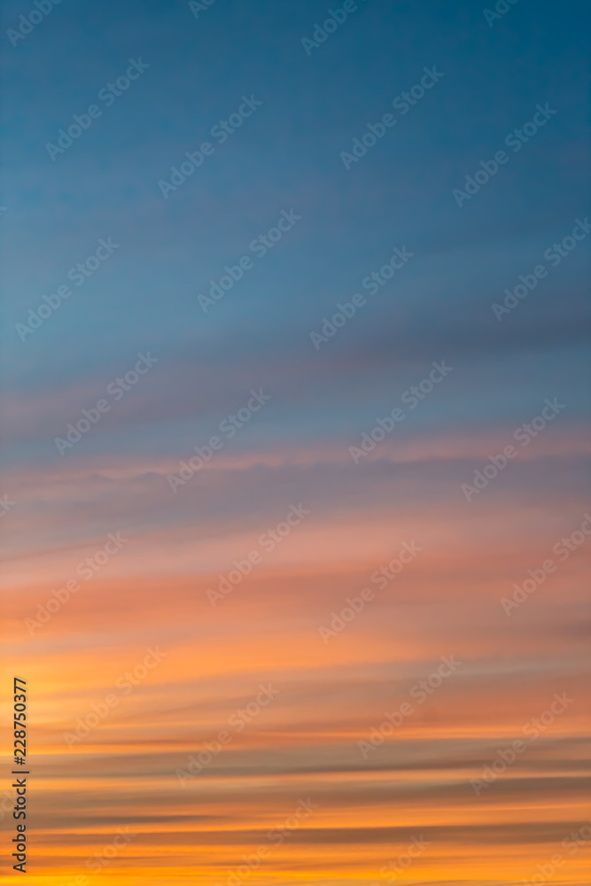 Obraz premium Light blue-orange sunset