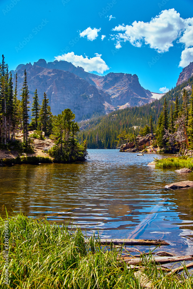 The Loch Lake in Rocky Mountains Landscape Pine Trees