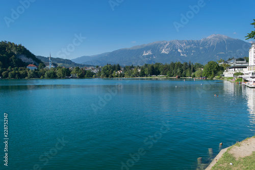 Fototapeta Naklejka Na Ścianę i Meble -  Lake Bled (Blejsko jezero) is a glacial lake in the Julian Alps in northwestern Slovenia, where it adjoins the town of Bled