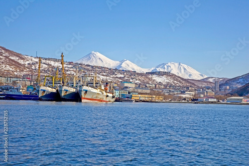 Petropavlovsk - Kamchatsky harbour in Avachinskaya Bay with volcanos in the background, Russia