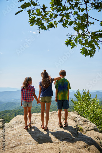 kids together on scenic mountain 