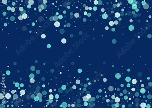 White glitter on blue background. 