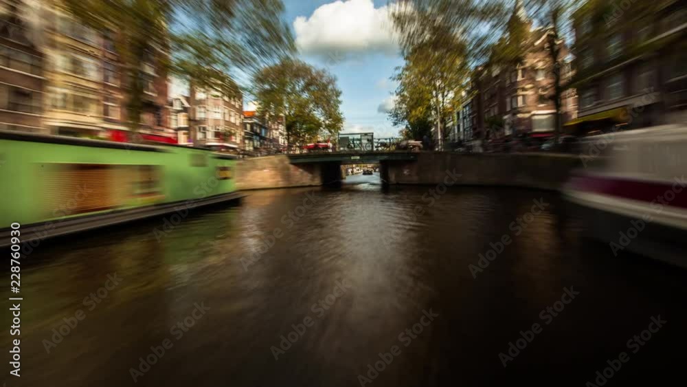 Time Lapse of passenger craft moving in canal, Paris, France
