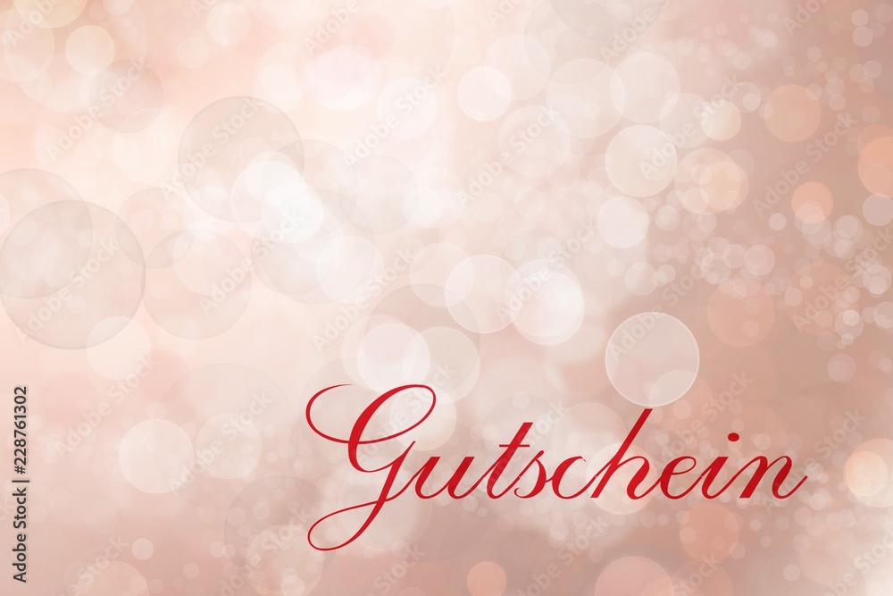 Gutschein auf roten unscharfen Hintergrund Gutschein auf roten unscharfen Hintergrund