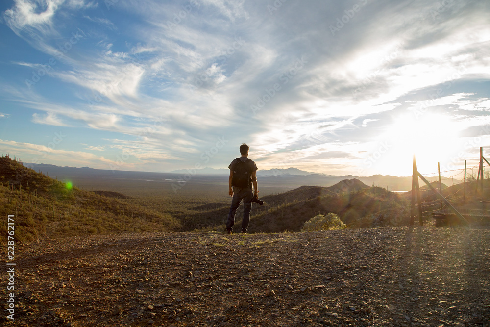 Man looks at the view in the desert