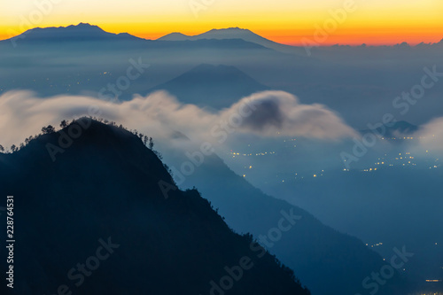 Silhouette Volcanoes mountains in Bromo Tengger Semeru National Park during Sunriset. Java, Indonesia