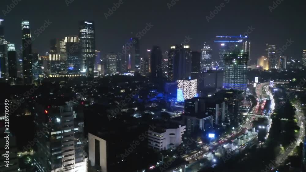 JAKARTA, Indonesia - October 15, 2018: Beautiful night aerial scenery of Jakarta downtown with view of night traffic and skyscrapers. Shot in 4k resolution JAKARTA, Indonesia - October 15, 2018: Beautiful night aerial scenery of Jakarta downtown with view of night traffic and skyscrapers. Shot in 4k resolution