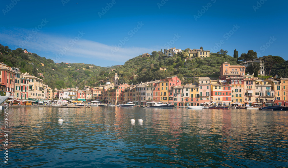 Portofino luxury landmark panorama. Village and yacht in little bay harbor. Liguria, Italy