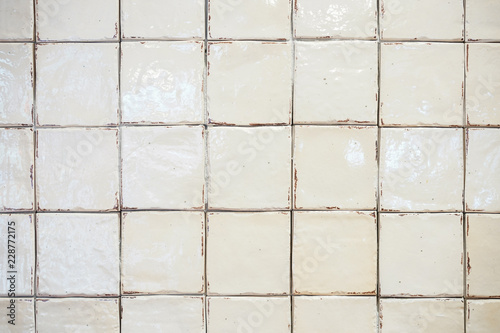 white old dirty tile wall in the bathroom, did not clean yet. © Surachetsh