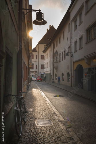 taly/Meran - On the street of Merano, a beautiful town in the Alpine mountains of South Tyrol. A view of the city photo