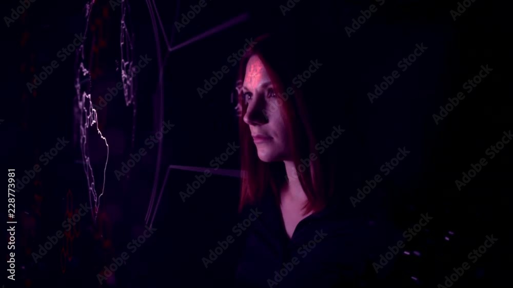 4K Portrait of a Woman Watching An Animated Cgi Screen With Globe 4K Portrait of a Woman Watching An Animated Cgi Screen With Globe