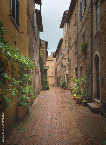 Beautiful and colorful streets of the small and historic Tuscan village Pienza  Italy