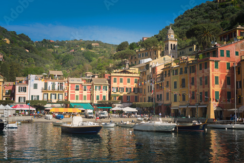 The beautiful Portofino panorama with colorfull houses  luxury boats and yacht in little bay harbor. Liguria  Italy