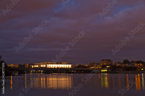 Washington DC panorama photographed from Arlington Memorial Bridge, USA. Night city skyline with reflection in quiet waters of Potomac River. © avmedved