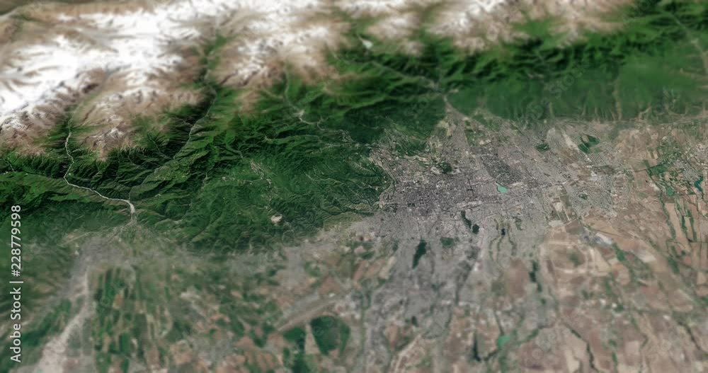 Very high-altitude circular tracking shot of Almaty, Kazakhstan with tilt-shift effect. Reversible. Elements of this image furnished by NASA. Very high-altitude circular tracking shot of Almaty, Kazakhstan with tilt-shift effect. Reversible. Elements of this image furnished by NASA.