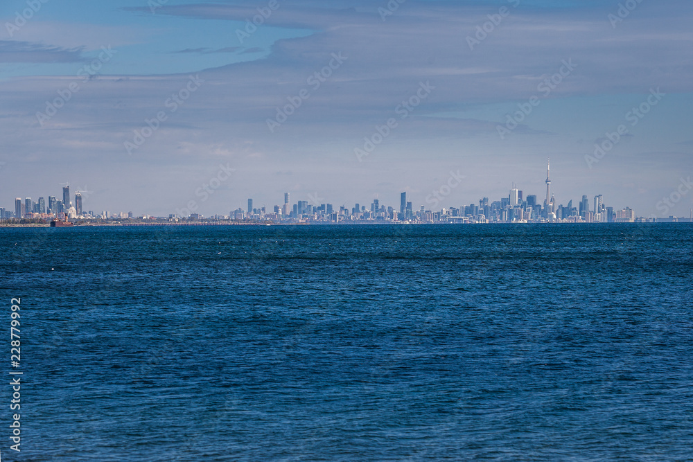 Toronto, CANADA - October 16, 2018: Panoramic view of the city of Toronto across Lake Ontario from the park in Mississauga